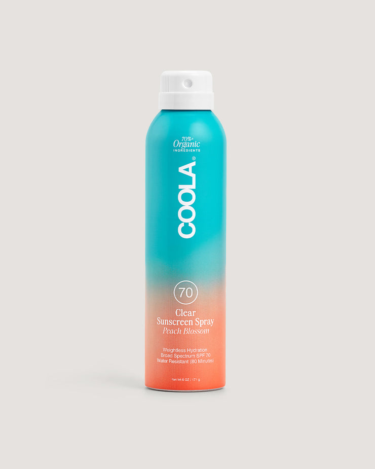 Bottle of COOLA Clear Sunscreen Spray Peach Blossom SPF 70