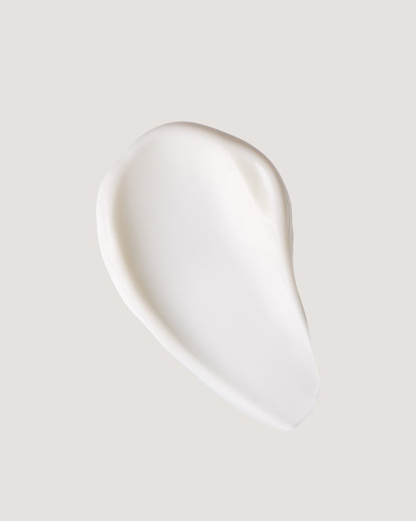 COOLA Radical Recovery Moisturizing Lotion formula swatch against neutral background