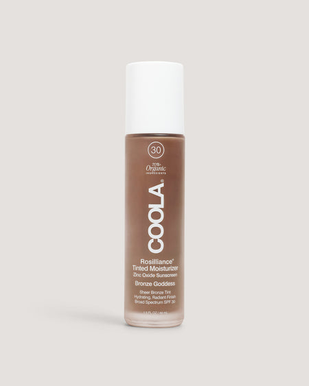 Coola Rosilliance Bronze Goddess Tinted Moisturizer standing up with neutral background
