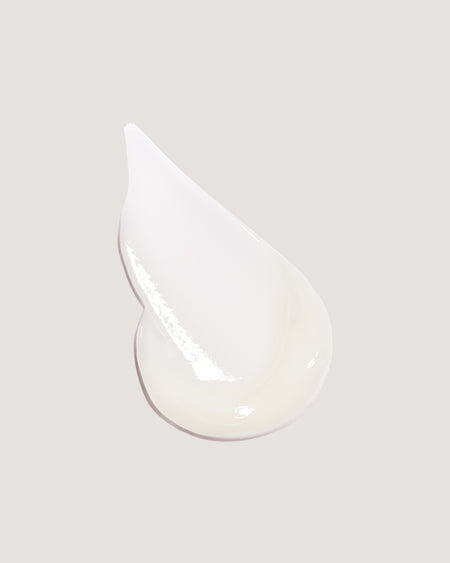 COOLA Vital Rush Skin Renewal Serum formula on beige background.