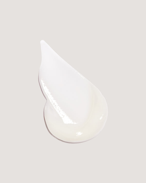 COOLA Vital Rush Skin Renewal Serum formula on beige background.