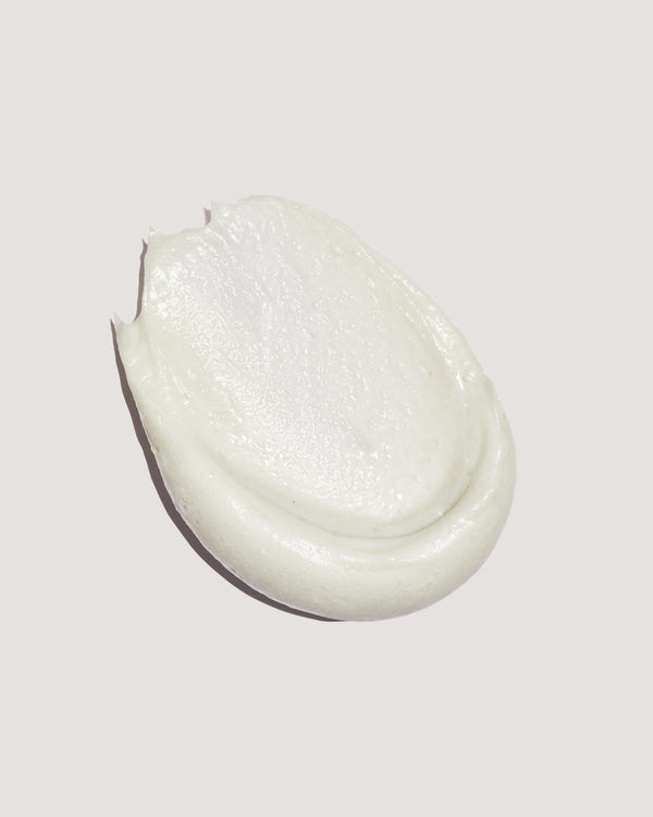 Coola skincare formula spread against a neutral background