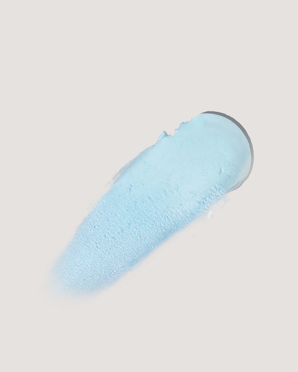 COOLA Refreshing Water Hydration Stick formula swatch with blue tint