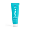 Travel sized Coola face sunscreen lotion on a transparent background