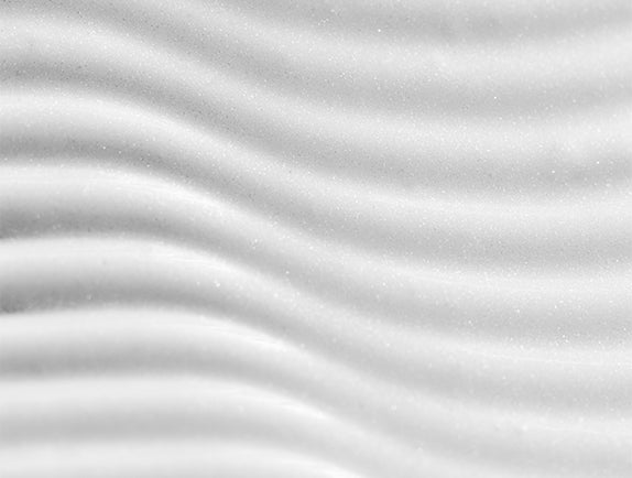 Wavy pattern of white sunscreen formula