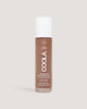 Coola Rosilliance Fresh Rose Tinted Moisturizer on neutral background