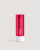 A red tube of COOLA Liplux Tinted Lip Balm with SPF 30, labeled 'Summer Crush'.