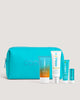COOLA Suncare Travel Essentials Set with TSA-friendly sunscreen kit and pouch