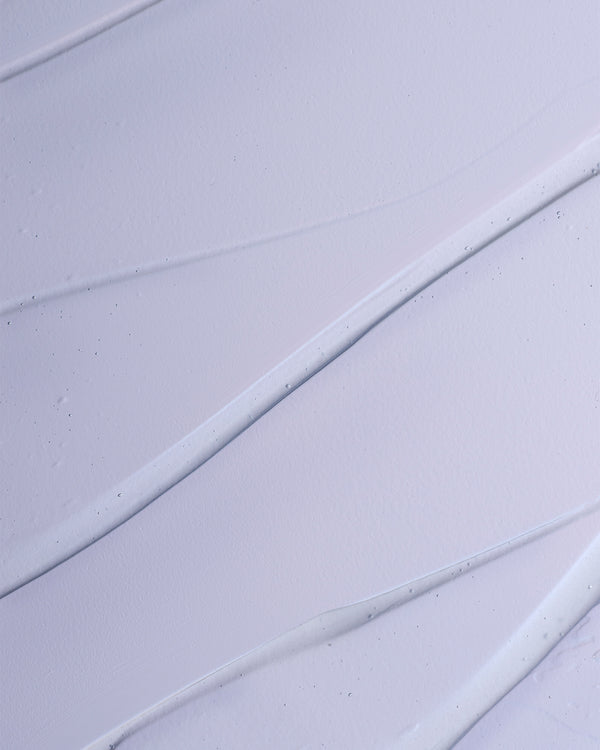 Close-up of a textured purple surface with diagonal lines