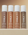 Rosilliance® Tinted Moisturizer - Sun Kissed by COOLA shown among four tinted moisturizer bottles with white caps and visible SPF 30 labeling