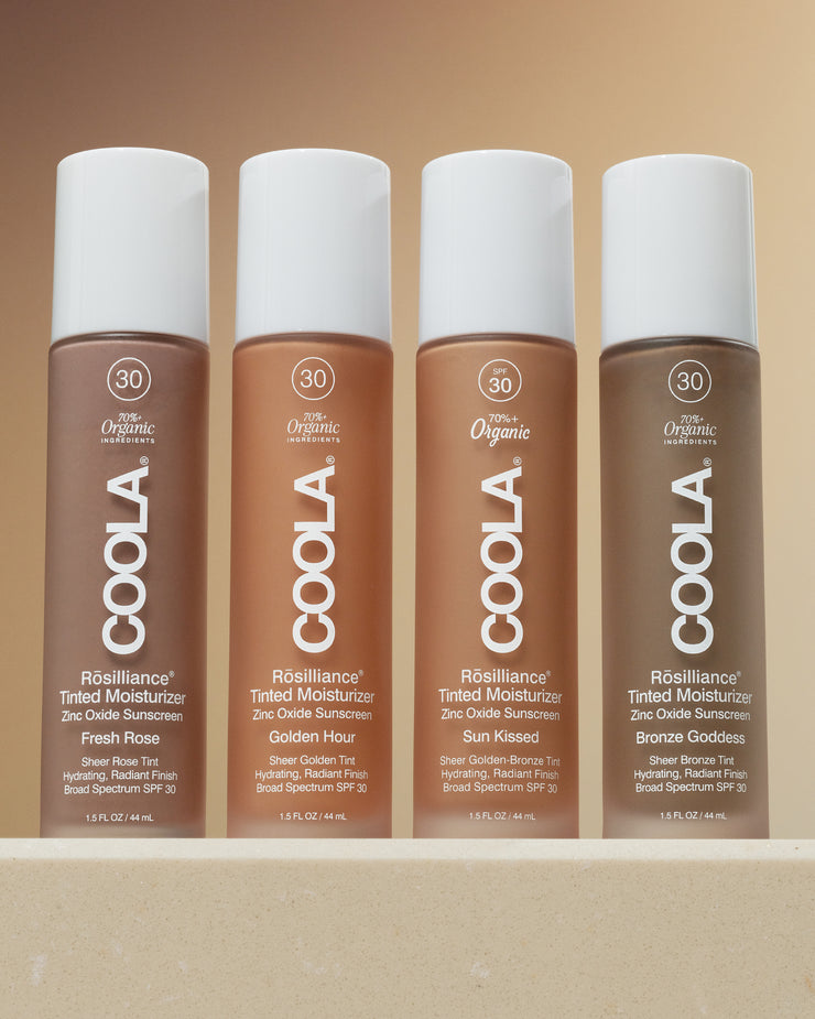 Rosilliance® Tinted Moisturizer - Sun Kissed by COOLA shown among four tinted moisturizer bottles with white caps and visible SPF 30 labeling