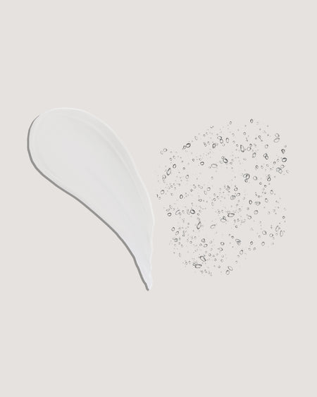 Clear silicone earbud on a light gray background