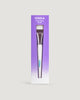 A packaged facial mask brush by COOLA, with the product visible at the bottom of the image.